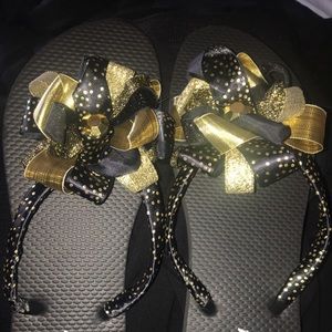 Black and Gold Flip Flops